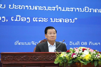  Laos, Vietnam exchange experiences on working methods and coordination